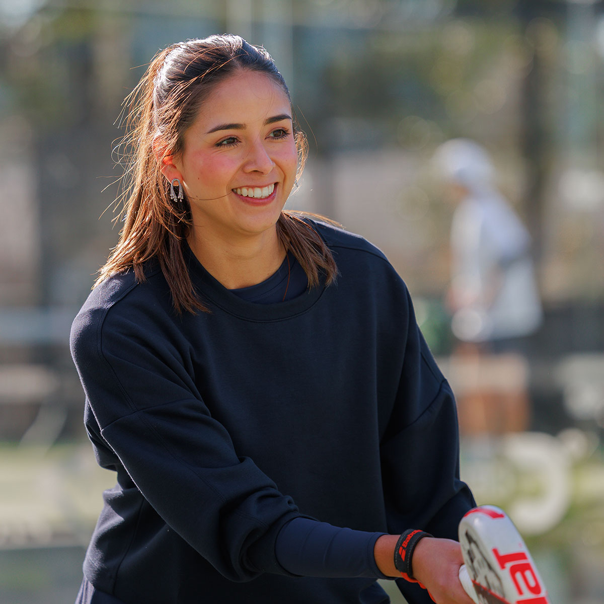 A player enjoying time on court at Padel39