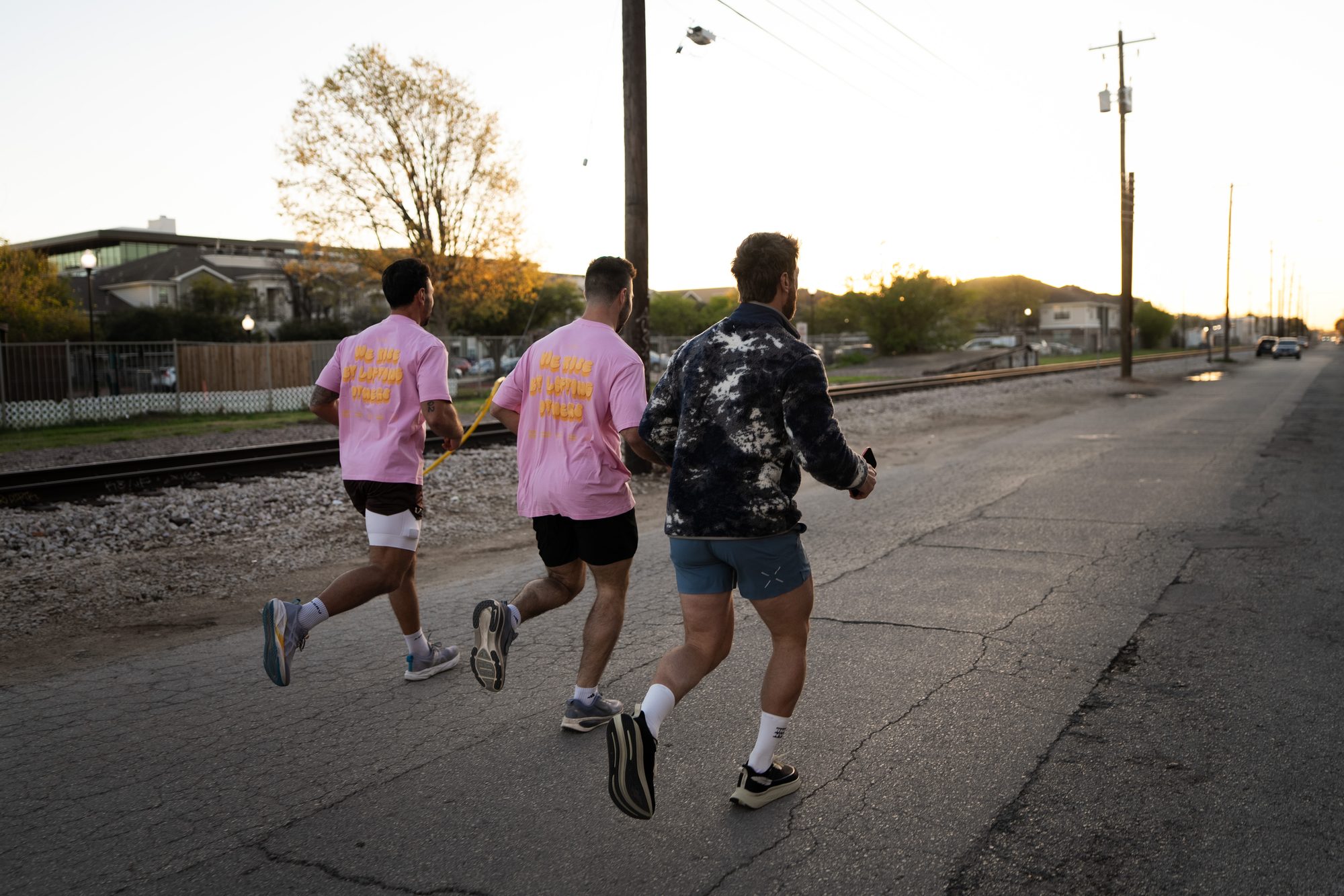 Willpower guests running together at sunrise