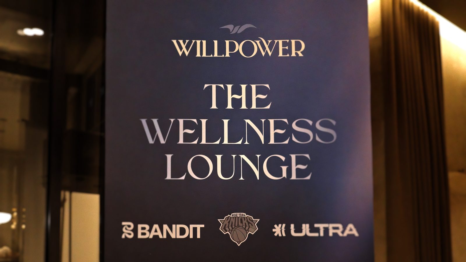 The Wellness Lounge banner with Bandit Running, New York Knicks, and Ultra
