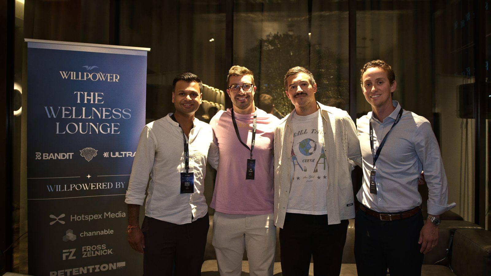 The Aug 19 speaker lineup in front of the Wellness Lounge banner