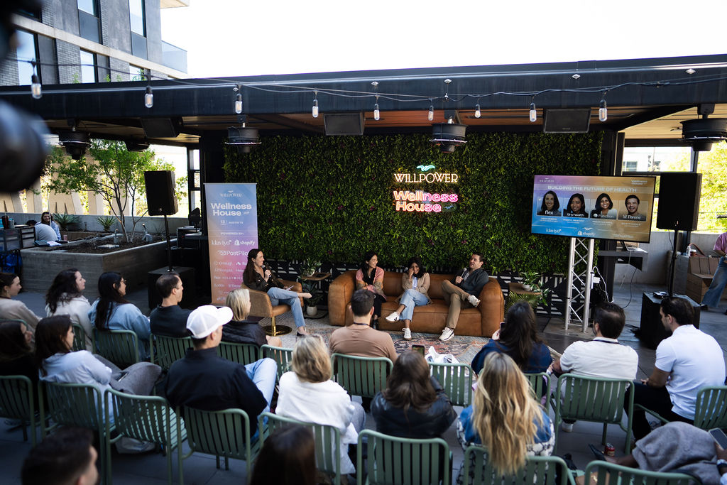 Wellness House 2026, panel on stage with audience