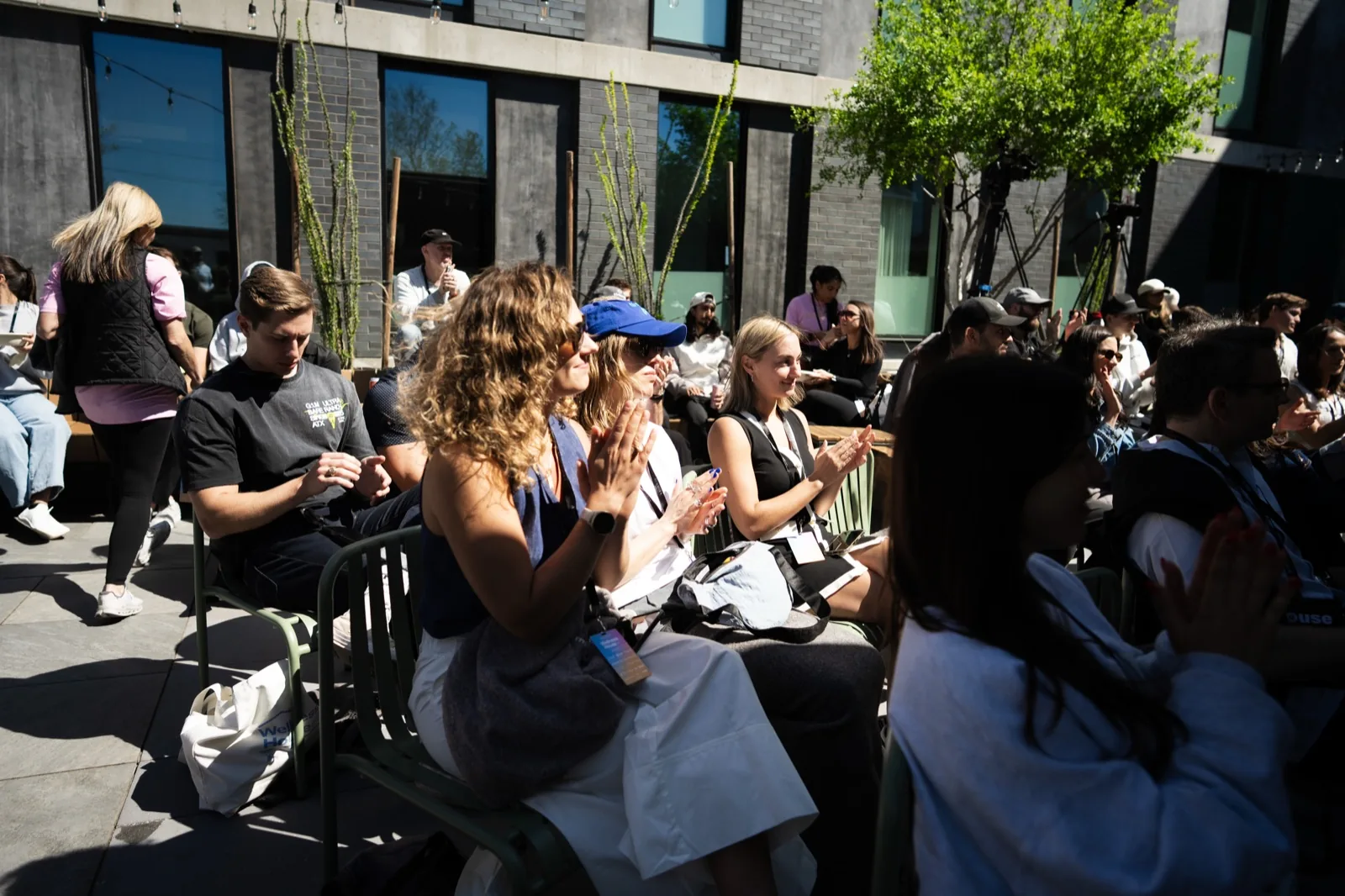 Guests gathered in the Wellness House courtyard in 2026
